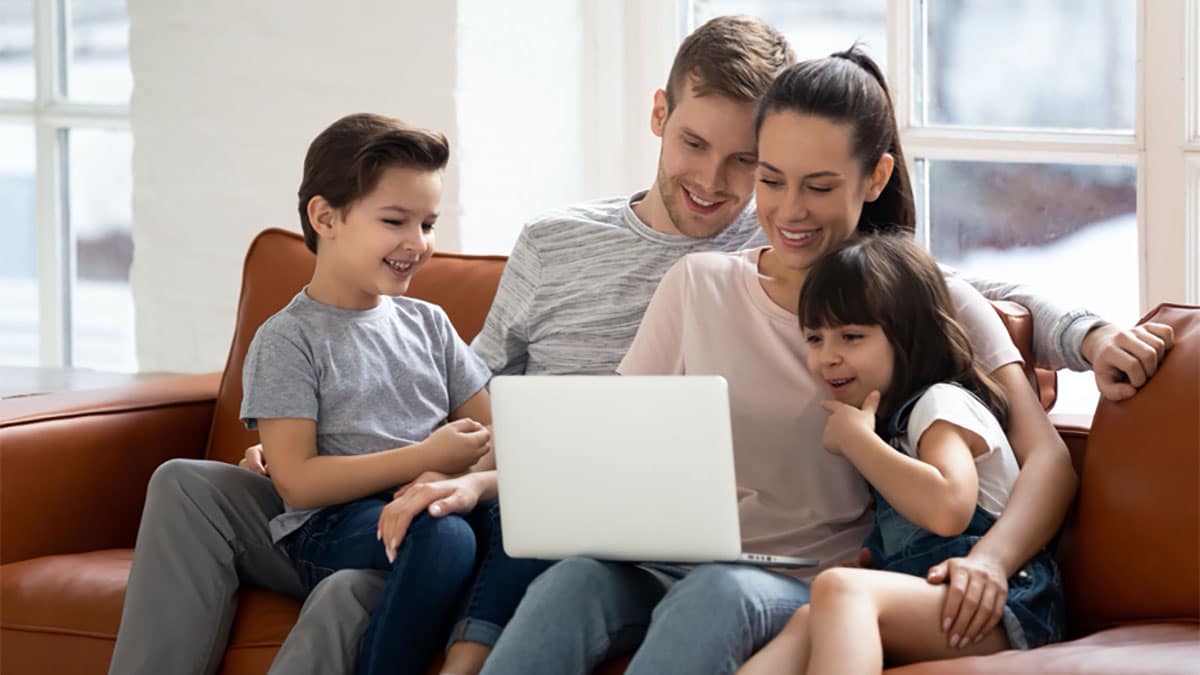 Family watching a laptop